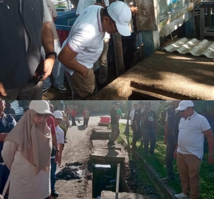 Bupati LAZ dan Wabup UNA bersama jajran gotong royong membersihkan saluran drainase di kawasan Hotel hingga Muara Pantai Senggigi.