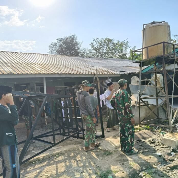 Satgas TMMD dan Santri Bangun Kerangka Tandon Air