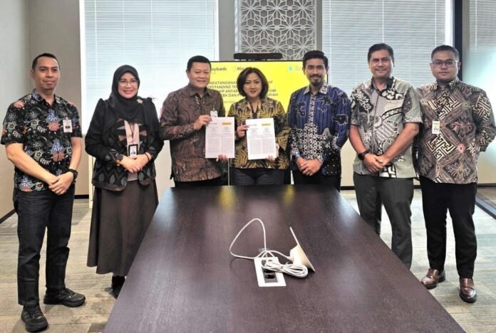 Perkuat Layanan PMI, Bank NTB Syariah dan Maybank Indonesia Jalin Kemitraan Strategis